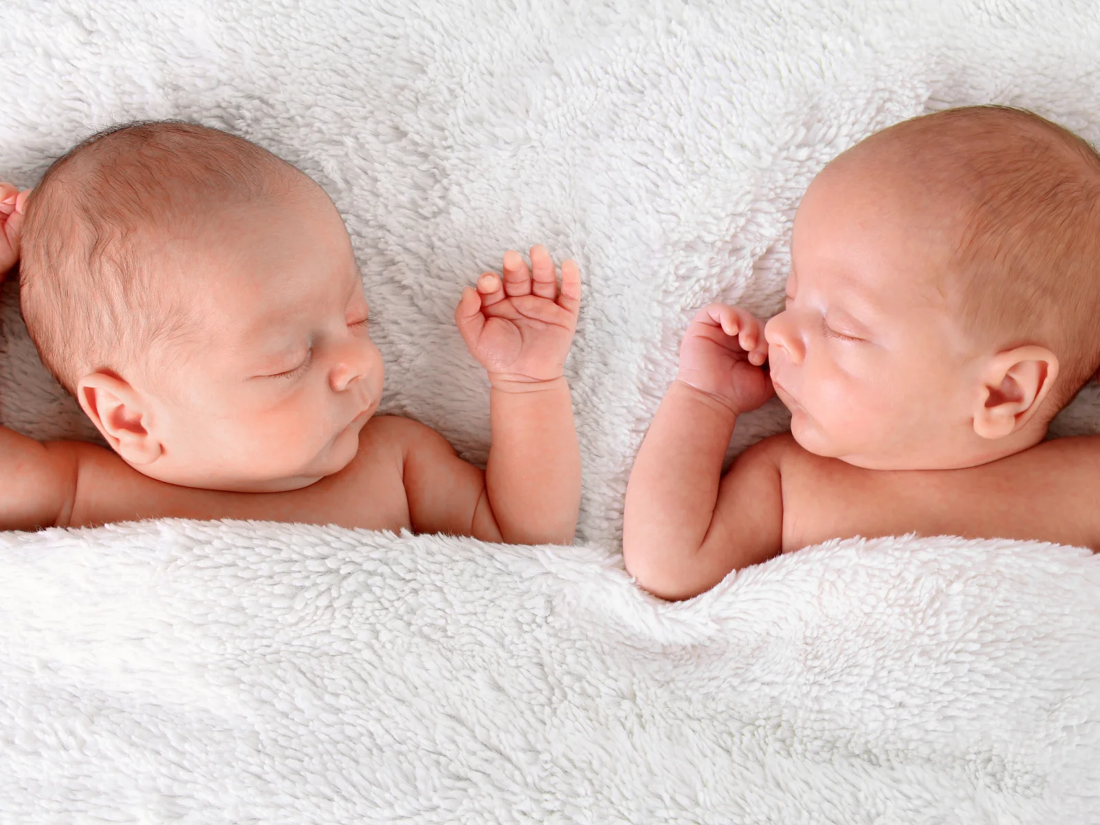 Identical Twins and DNA: Are Their Genes 100% the Same?